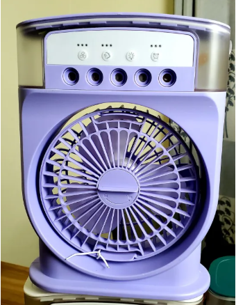 Air Cooler Fan 3 in 1 Mini Portable Fan Humidifier with 7 Colors LED Light Air Cooler 600ml Water Tank Air Cooling Fan This is rechargeable